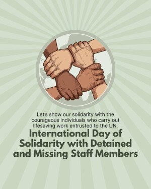 Hands clasped together in solidarity with text commemorating the International Day of Solidarity with Detained and Missing Staff Members.