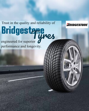 Close-up of a Bridgestone tyre on a road with the Bridgestone logo.