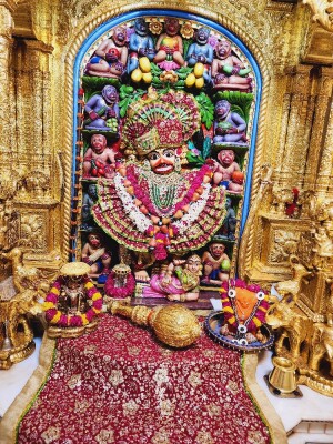 Close-up of a beautifully decorated Hanuman idol in a temple