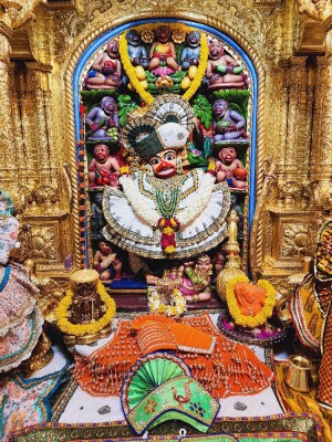 Close-up of a beautifully decorated Hanuman idol in a temple