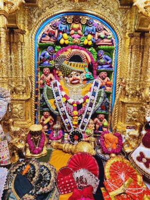 Close-up of a beautifully decorated Hanuman idol in a temple