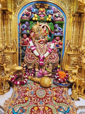 Close-up of a beautifully decorated Hanuman idol in a temple