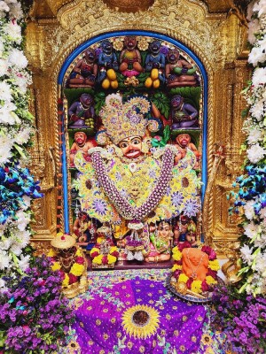 Close-up of a beautifully decorated Hanuman idol in a temple