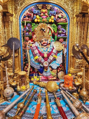 Close-up of a beautifully decorated Hanuman idol in a temple