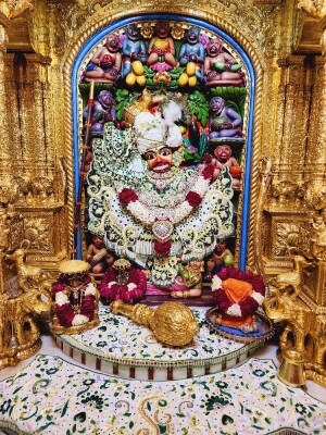 Close-up of a beautifully decorated Hanuman idol in a temple