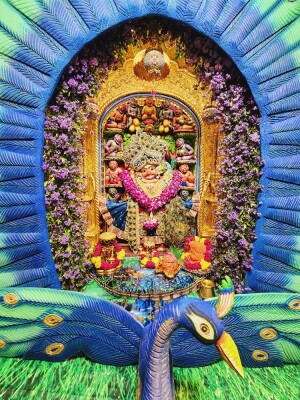 Intricate floral decoration of Hanuman Ji idol in a temple