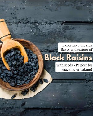 Close-up of black raisins in a wooden bowl with a wooden spoon