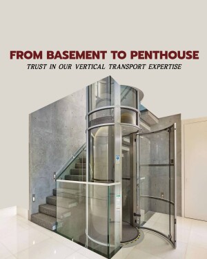 A modern glass home elevator installed in a residential building.