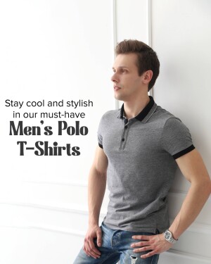 A man wearing a grey polo t-shirt leaning against a white wall.