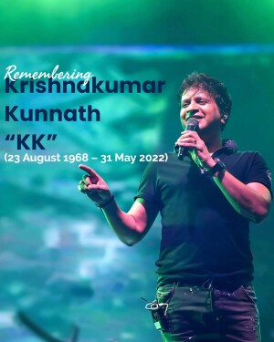 Portrait of KK, the Indian singer, performing on stage.