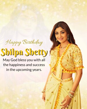 Shilpa Shetty in a yellow saree with a birthday greeting