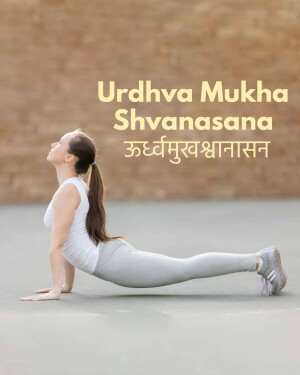 Woman performing the Urdhva Mukha Shvanasana yoga pose.