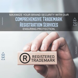 Hand holding wooden blocks with a registered trademark symbol