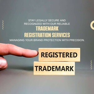 Hand placing a block with 'Registered Trademark' text on top of another block.