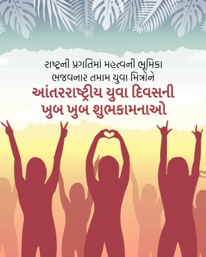 Group of people celebrating International Youth Day with hands raised and palm hearts.