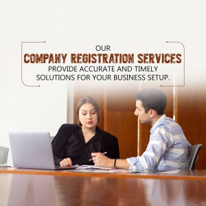 Image depicting professionals discussing company registration with a laptop.