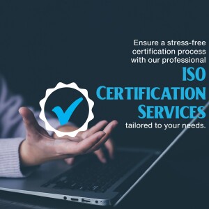Hand holding a glowing ISO certification badge over a laptop