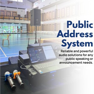 Public address system with laptop, microphones, and speakers in a gymnasium.