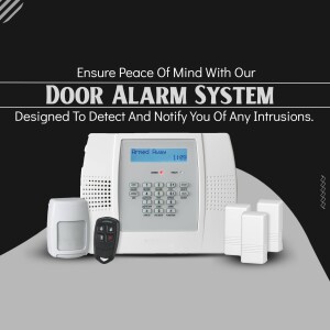 White door alarm system with sensors and keypad on a gray surface