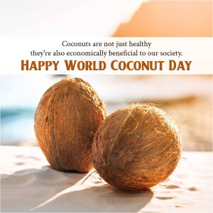 Two coconuts on a sandy beach with text celebrating World Coconut Day