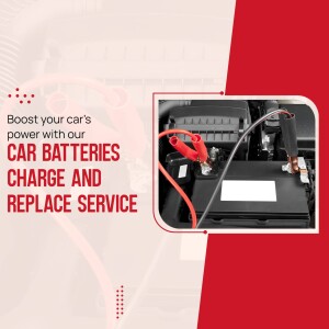 Car battery being jump-started with red cables