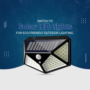 Close-up of a black solar-powered LED outdoor light with motion sensor.