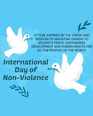 Two white doves flying with olive branches over a world map, with text celebrating International Day of Non-Violence and Mahatma Gandhi's vision.