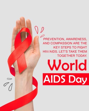 A hand holding a red ribbon, symbolizing World AIDS Day and HIV/AIDS awareness.