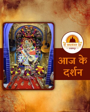 Image of Lord Krishna idol adorned with flowers and decorations in a temple setting.