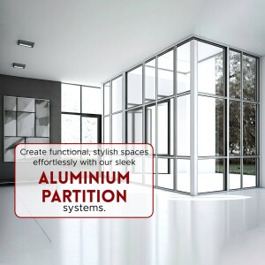 Interior view of a room with large aluminium partition walls and a red promotional banner.