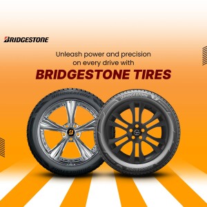 Bridgestone tires on silver rims with orange and white background