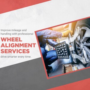 Wheel alignment service with a mechanic working on a car wheel