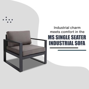 A stylish black metal frame single seater sofa with a grey cushion.