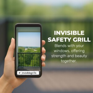 Hand holding a smartphone displaying an invisible safety grill on a balcony.
