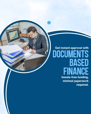 Man working at a desk with documents and a computer, promoting document-based finance.