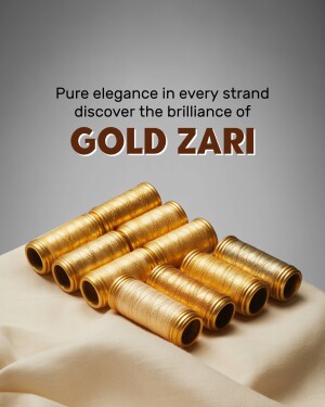 Close-up of gold zari threads arranged on a fabric background