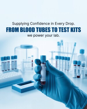 Image of a gloved hand holding a blood tube with other lab equipment in the background.