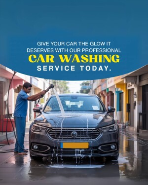 Man washing a gray car with foam on a city street