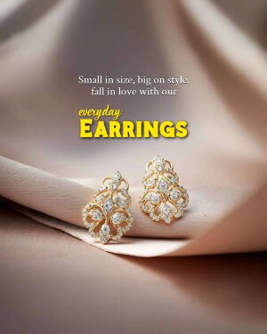 Close-up of sparkling diamond earrings on a silk cloth
