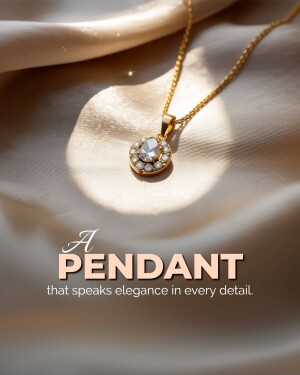 Close-up of a gold pendant with a sparkling gemstone on a textured fabric background.