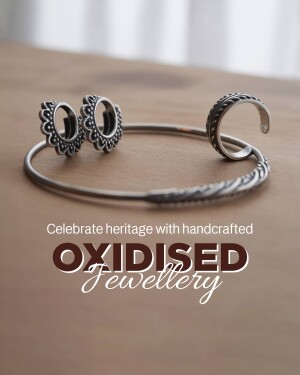 Close-up of oxidised silver jewellery including earrings and a cuff bracelet.