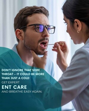 Doctor examining a patient's throat with a tongue depressor.