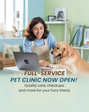 Woman working on laptop with golden retriever at a pet clinic