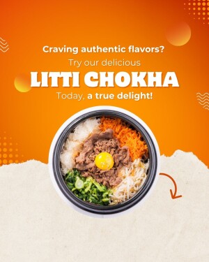 Close-up of Litti Chokha in a black bowl with vibrant colors and a yolk on top.