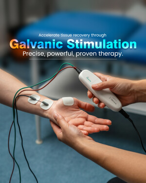 Close-up of a patient receiving Galvanic Stimulation therapy with electrodes attached to their wrist.