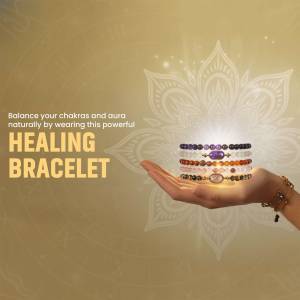 Hand holding a colorful chakra healing bracelet with a golden background.