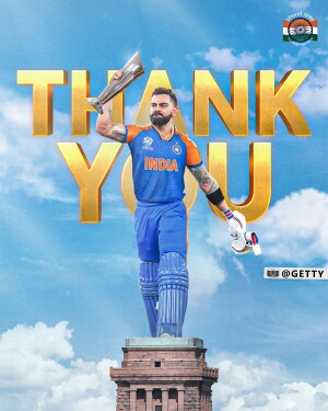 Virat Kohli celebrating with a golden sword on a statue base