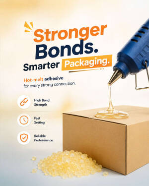A glue gun applying hot-melt adhesive to a cardboard box with adhesive pellets in the foreground.