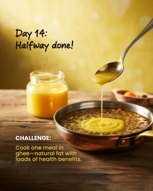 Close-up of ghee being drizzled over a lentil dish, with a jar of ghee in the background.
