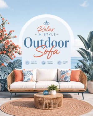 A modern outdoor sofa with orange and floral cushions set on a patio with tropical plants and a coastal view.